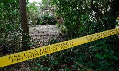 Un cordón policial en el perímetro de una fosa en el estado de Veracruz / Yahir Ceballos / Reuters