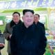 / El líder norcoreano Kim Jong-Un (C) visitando la Academia de Ciencias del Estado de la Academia Estatal de Ciencias, el 13 de enero de 2018. KCNA VIA KNS / AFP